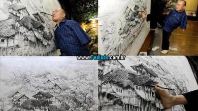 O artista chinês Huang Guofu pinta usando apenas a boca e os pés 46