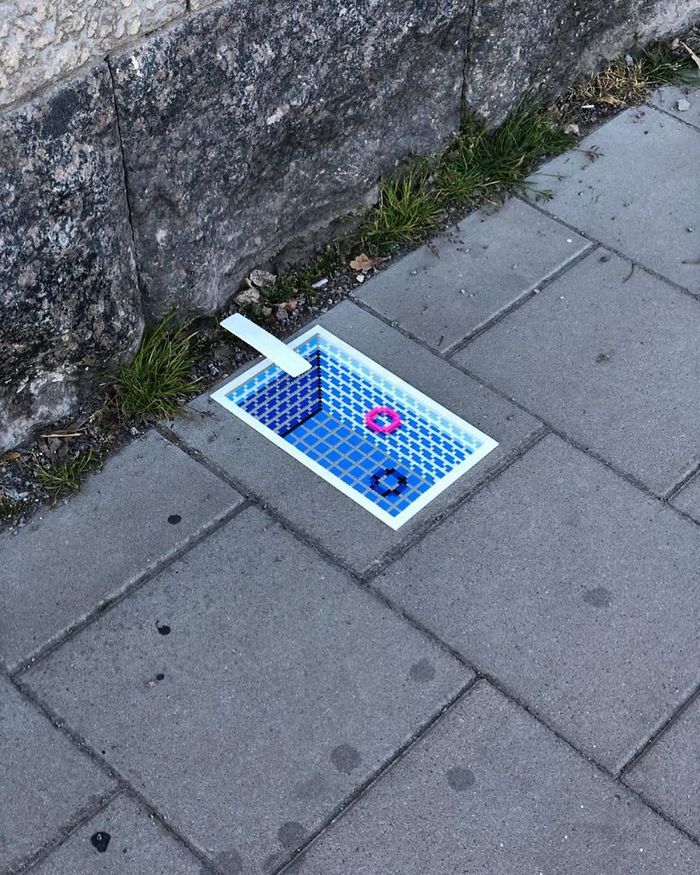 Artista sueco espalha sua impressionante arte Pixel pela cidade 22