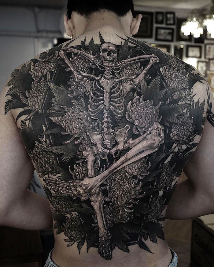30 tatuagens impressionantes nas costas que são obras-primas 8