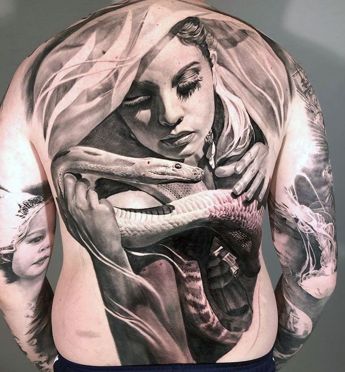 30 tatuagens impressionantes nas costas que são obras-primas 9
