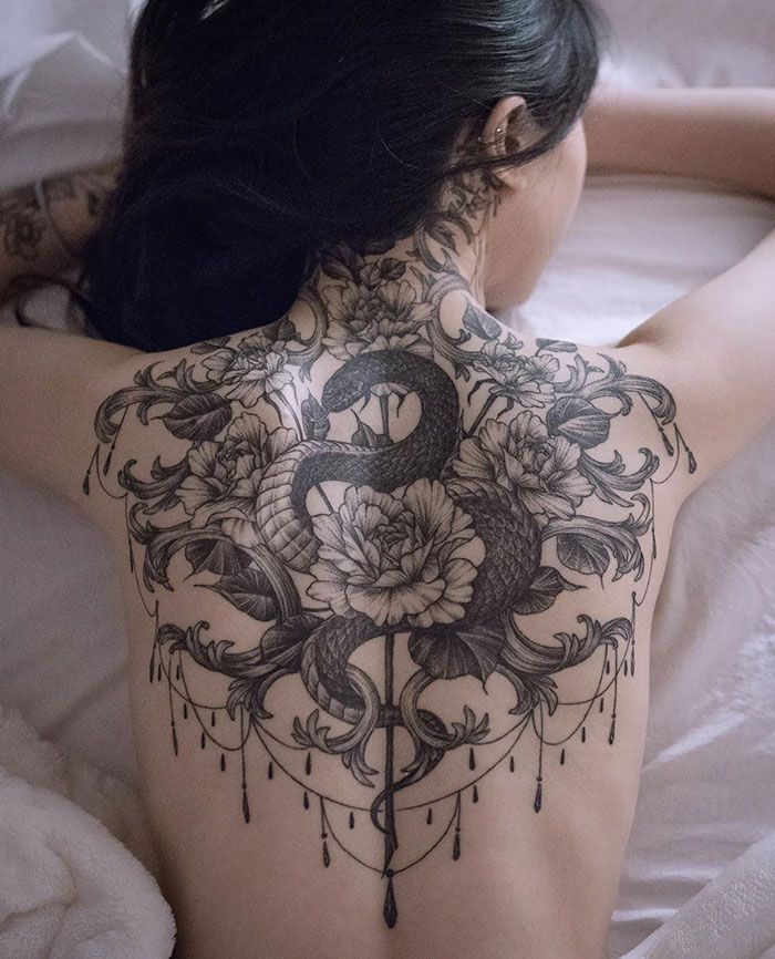 30 tatuagens impressionantes nas costas que são obras-primas 18