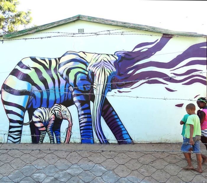 Artista sul-africano pinta grafites incríveis que interagem com o ambiente (32 fotos) 7