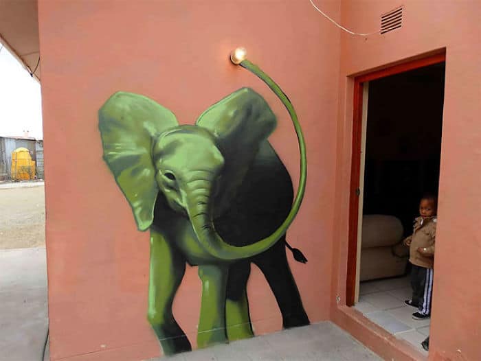 Artista sul-africano pinta grafites incríveis que interagem com o ambiente (32 fotos) 9