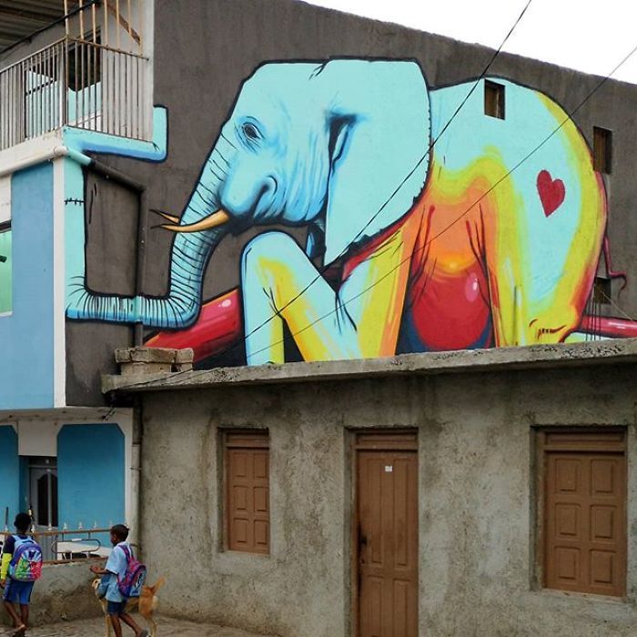 Artista sul-africano pinta grafites incríveis que interagem com o ambiente (32 fotos) 23