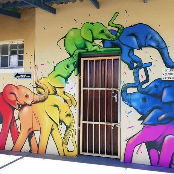 Artista sul-africano pinta grafites incríveis que interagem com o ambiente (32 fotos) 27