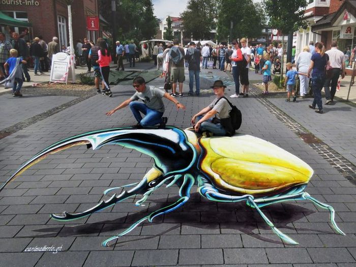 Um artista ilumina ruas com sua arte em 3D, tão mágica que vai fazer você questionar a realidade 8