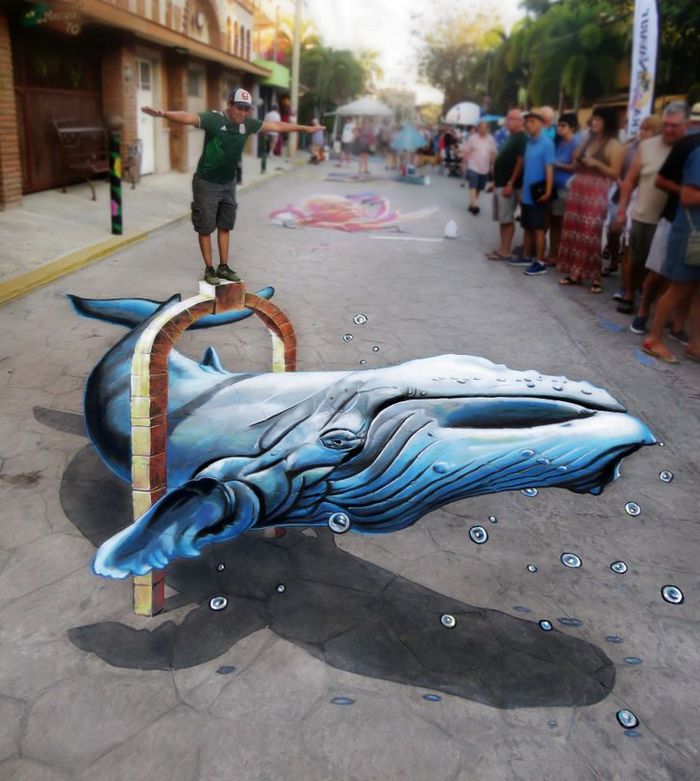 Um artista ilumina ruas com sua arte em 3D, tão mágica que vai fazer você questionar a realidade 12