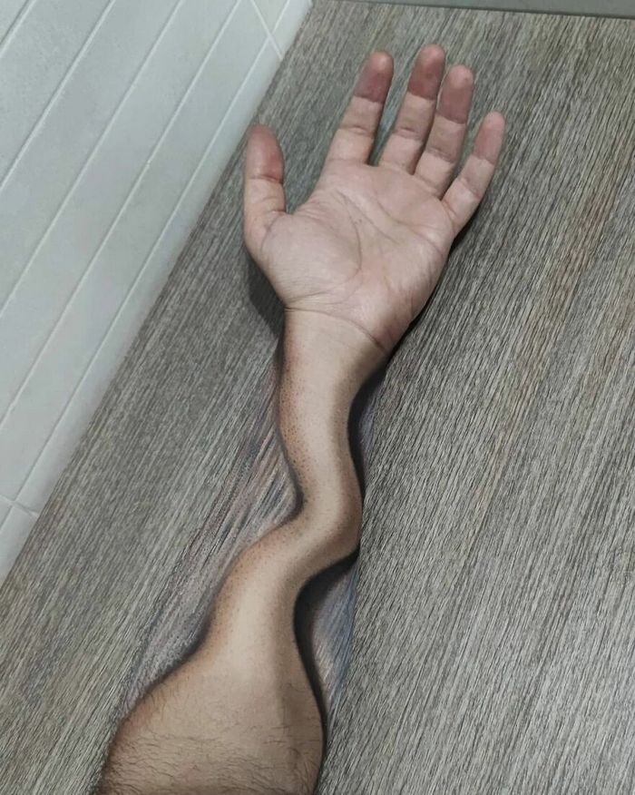 Artista italiano usa seu corpo como uma tela para criar ilusões ópticas realistas (42 fotos) 31
