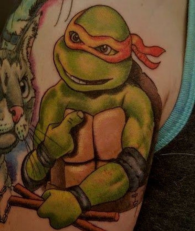 25 pessoas que transformaram memórias de infância em tatuagens dignas de serem premiadas 4