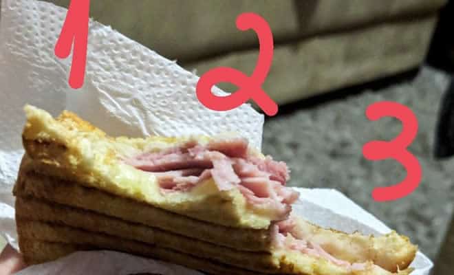 Como você morde um sanduíche oferecido por outra pessoa?