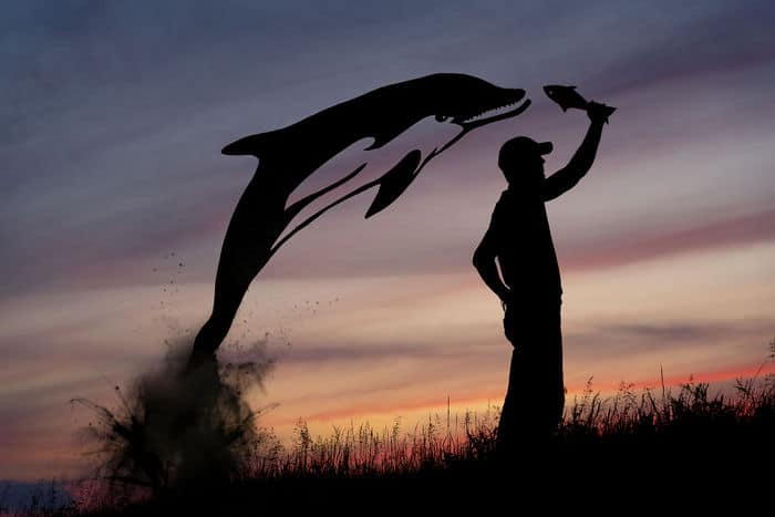 Este artista recorta papelão para criar obras mágicas ao pôr do sol 33