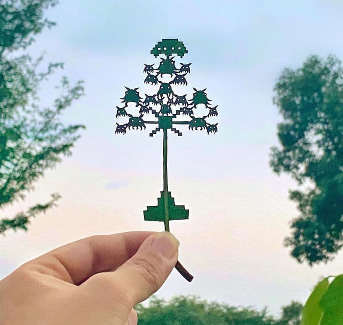 Artista japonês cria obras de arte com recortes em folhas 36