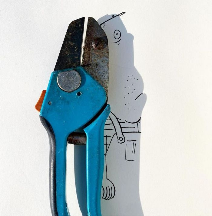 Um artista belga usa sombras para dar vida a objetos 23