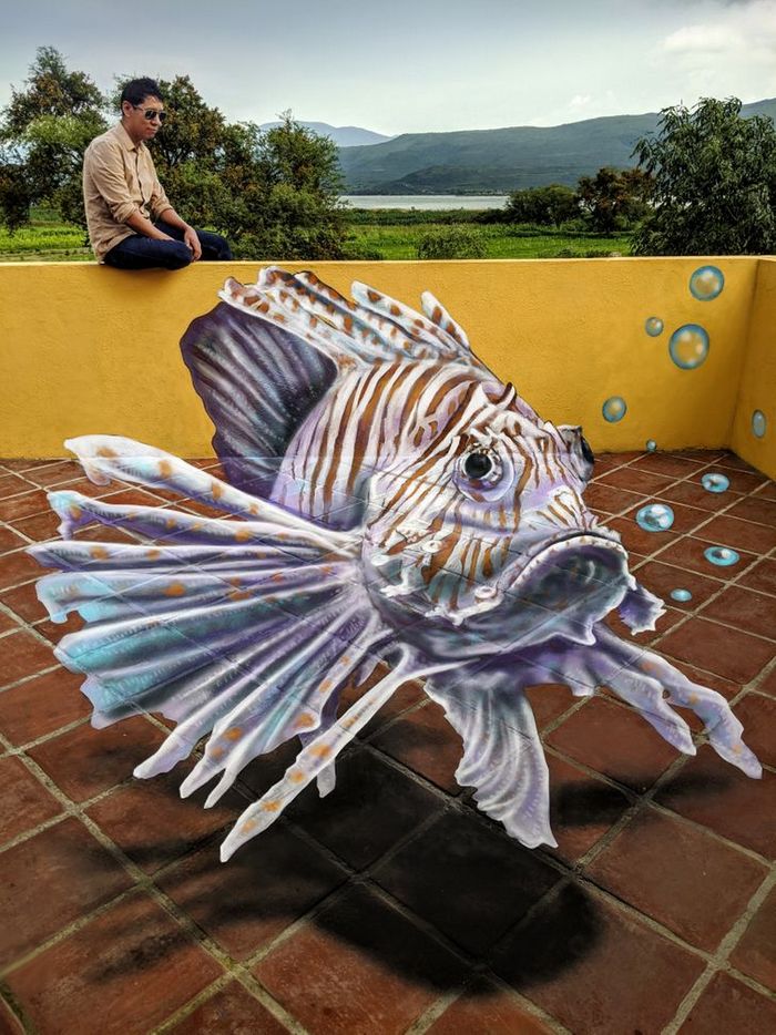 Um artista ilumina ruas com sua arte em 3D, tão mágica que vai fazer você questionar a realidade 6