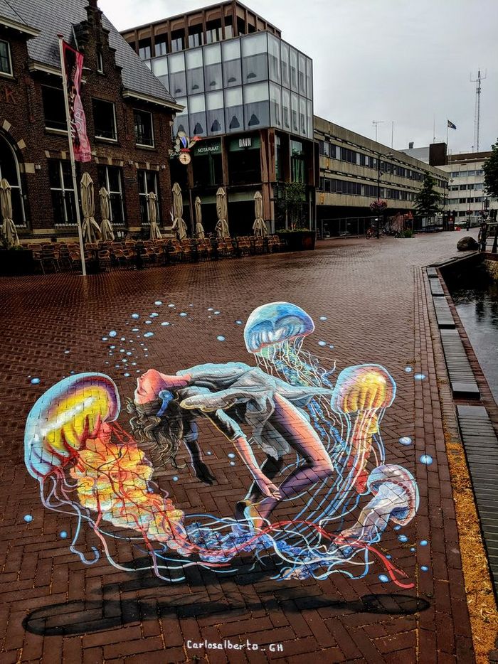 Um artista ilumina ruas com sua arte em 3D, tão mágica que vai fazer você questionar a realidade 16