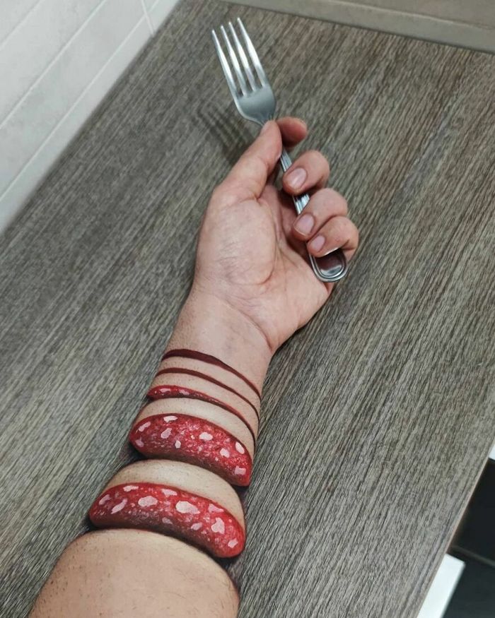 Artista italiano usa seu corpo como uma tela para criar ilusões ópticas realistas (42 fotos) 4