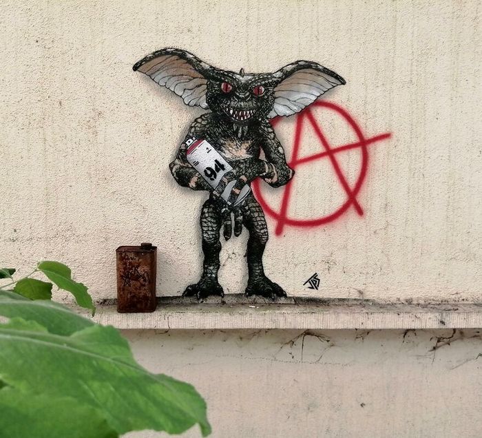 Artista torna as ruas divertidas ao criar grafites que interagem com o ambiente (46 fotos) 36