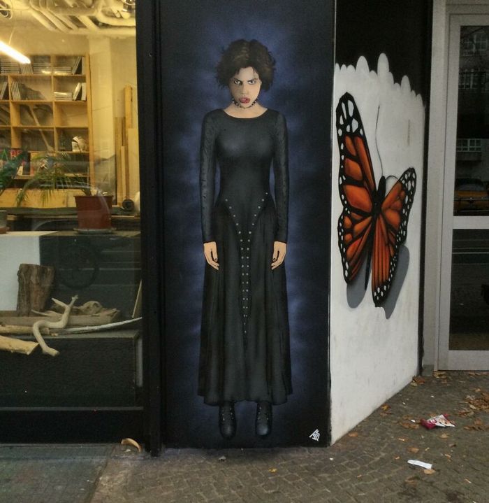 Artista torna as ruas divertidas ao criar grafites que interagem com o ambiente (46 fotos) 41