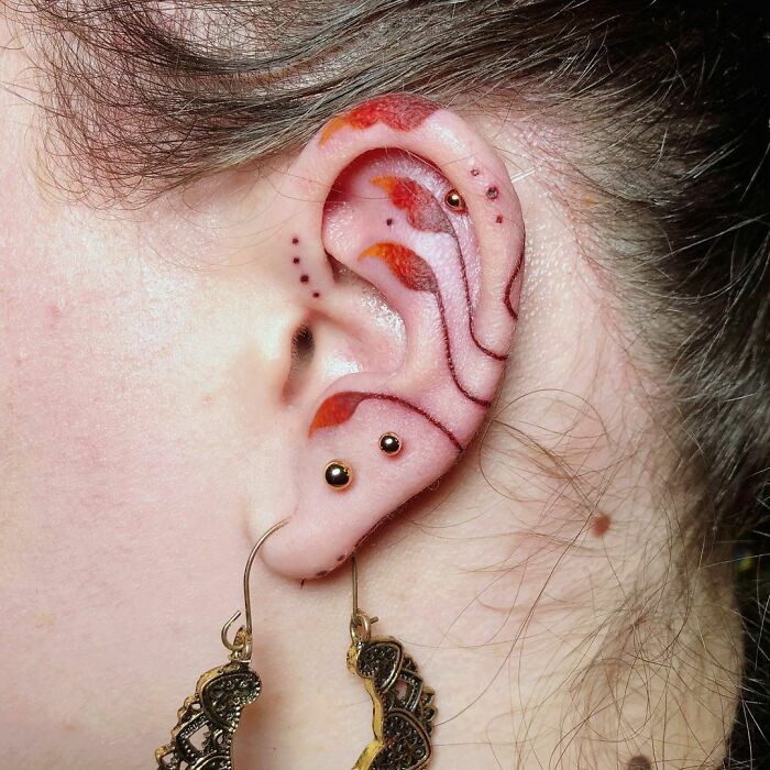 42 ideias de tatuagens de orelha que vão de sutil a selvagem 10