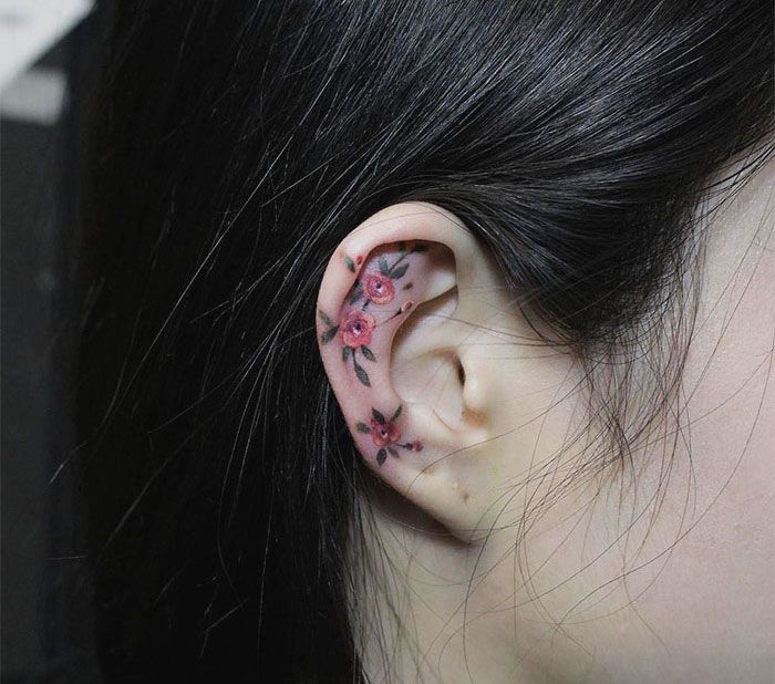 42 ideias de tatuagens de orelha que vão de sutil a selvagem 42