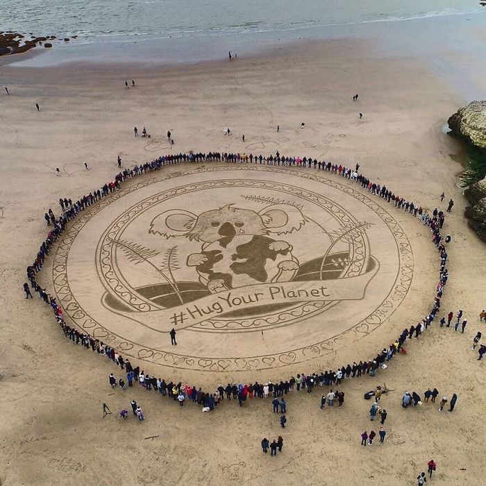 Artista produz grandiosas obras de arte na areia da praia (32 fotos) 29