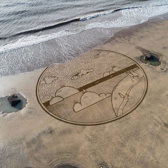 Artista produz grandiosas obras de arte na areia da praia (32 fotos) 31