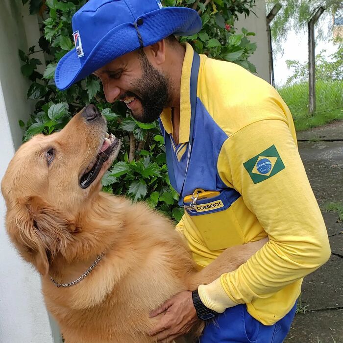 Antunes: O carteiro que está transformando cães em seus melhores amigos (32 fotos) 1