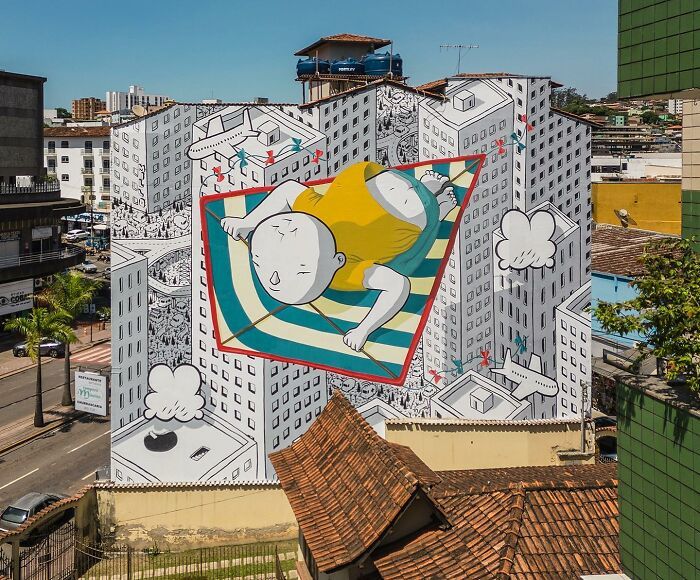 Millo: O artista de rua italiano que transforma prédios em sonhos poéticos (32 fotos) 31