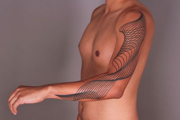 32 tatuagens minimalistas de linhas: A arte que parece simples, mas esconde muito mais do que você imagina 18 32 tatuagens minimalistas de linhas: A arte que parece simples, mas esconde muito mais do que você imagina 18